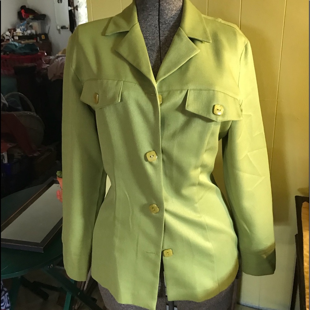 Green blazer with 4 buttons. Very flattering